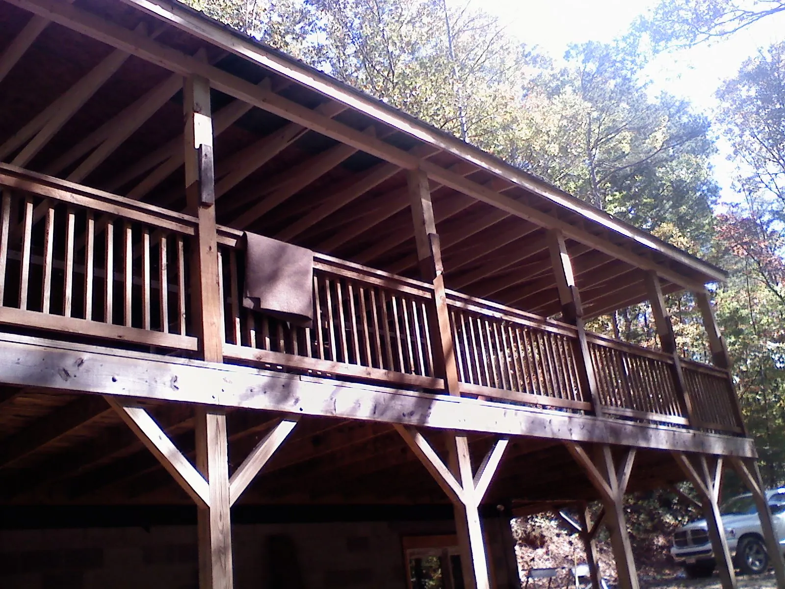 Timber framing under a new elevated porch and deck — Roof Leak Repair in Mandaree by Roofing Brothers